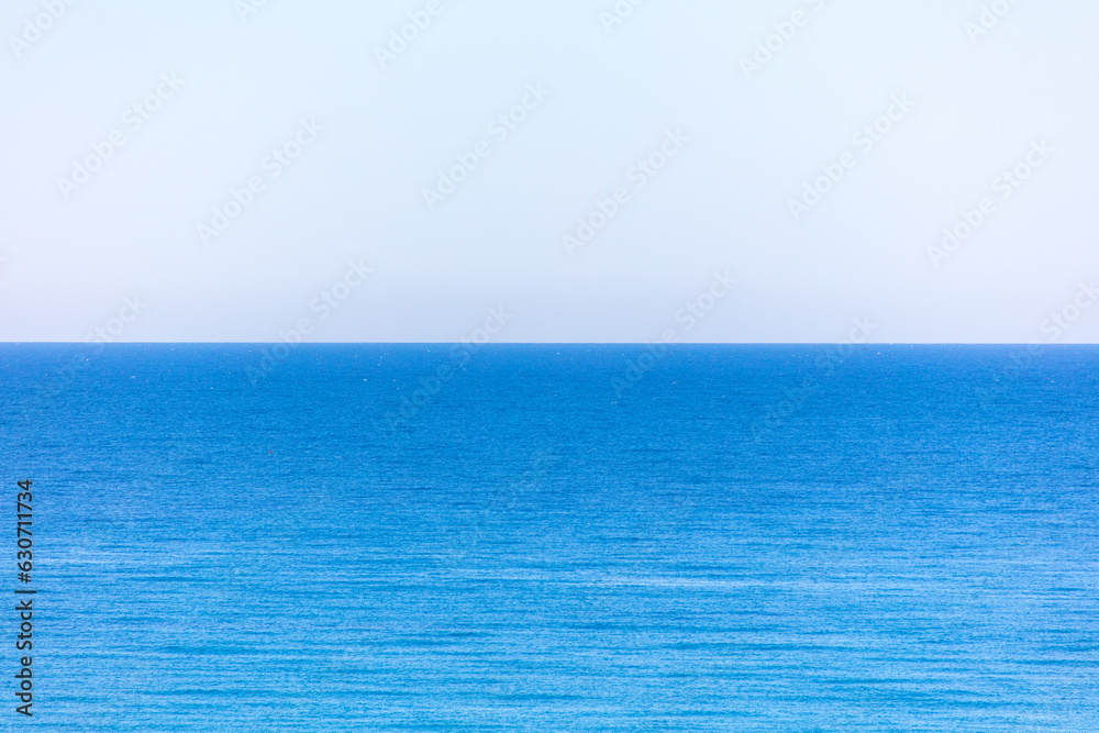 Obraz premium Blue sea and sky horizon.