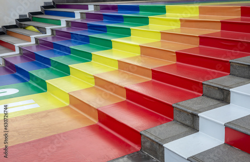 Billede på lærred A close-up view of the background up stairs decorated with beautiful rainbow-colored