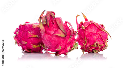 Ripe red dragon fruit on an isolated white background