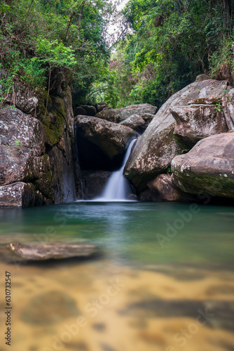 Tranquil Scene of a Small Silky Waterfall in a Tropical Rainforest