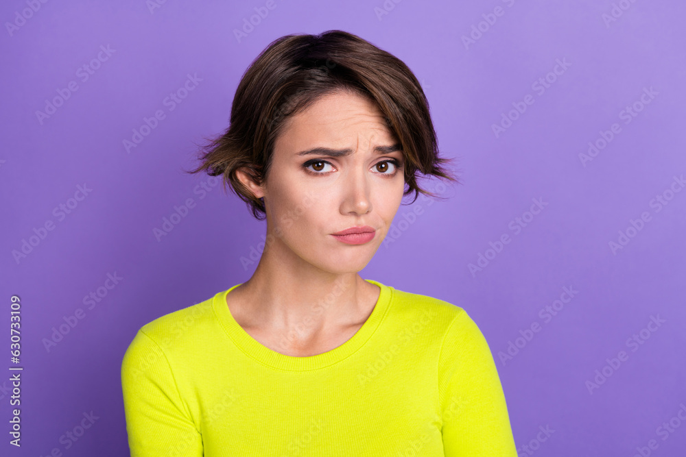 Portrait of unsatisfied pretty person sullen face bad mood difficult problem solution isolated on purple color background Portrait of unsatisfied pretty person sullen face bad mood difficult problem solution isolated on purple color background