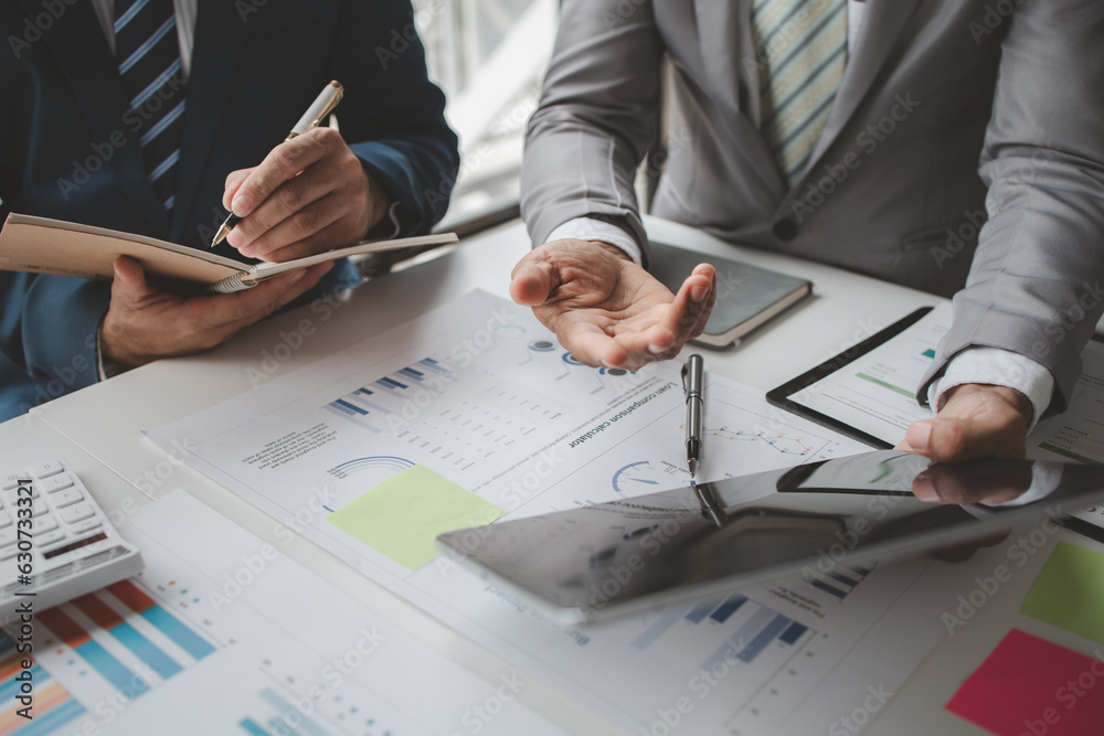 Atmosphere of a startup company meeting, business people are meeting together to summarize and plan investment finances, they are the founders of the company. Business administration concept.