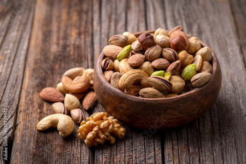 Mixed nuts on a white backg...