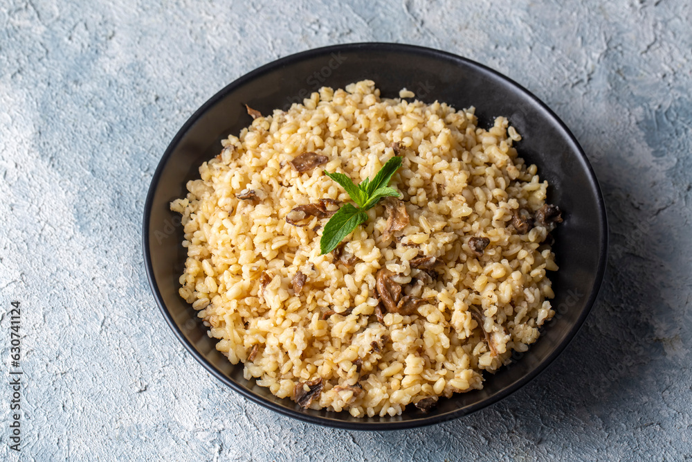 Bulgur pilaf with mushrooms, food concept photo. Bulgur pilaf with mushrooms, food concept photo.