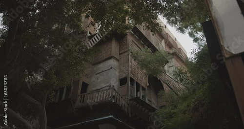 Old houses with wooden mashrabiya in al-Balad quarterJeddah  Saudi Arabia photo