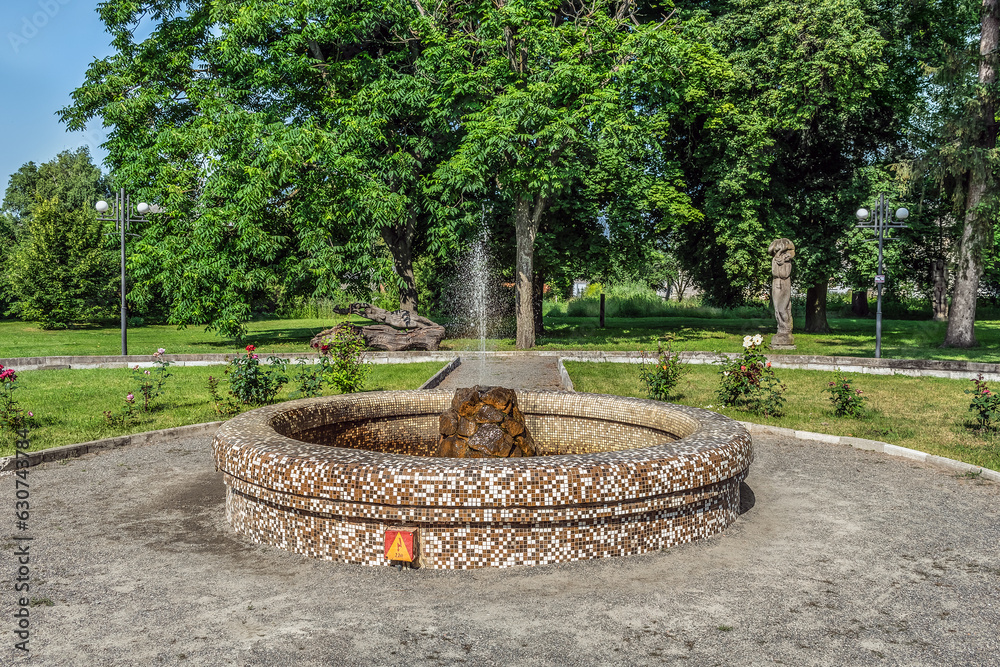 Fountain in the city garden near the Manor of Koenig in Trostyanets, Sumy Oblast, Ukraine. Summer landscape in the park