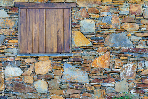 local quarried schist shale house features weathered and textured