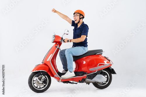 full body photo of a man wearing a hairdresser and driving a motorbike