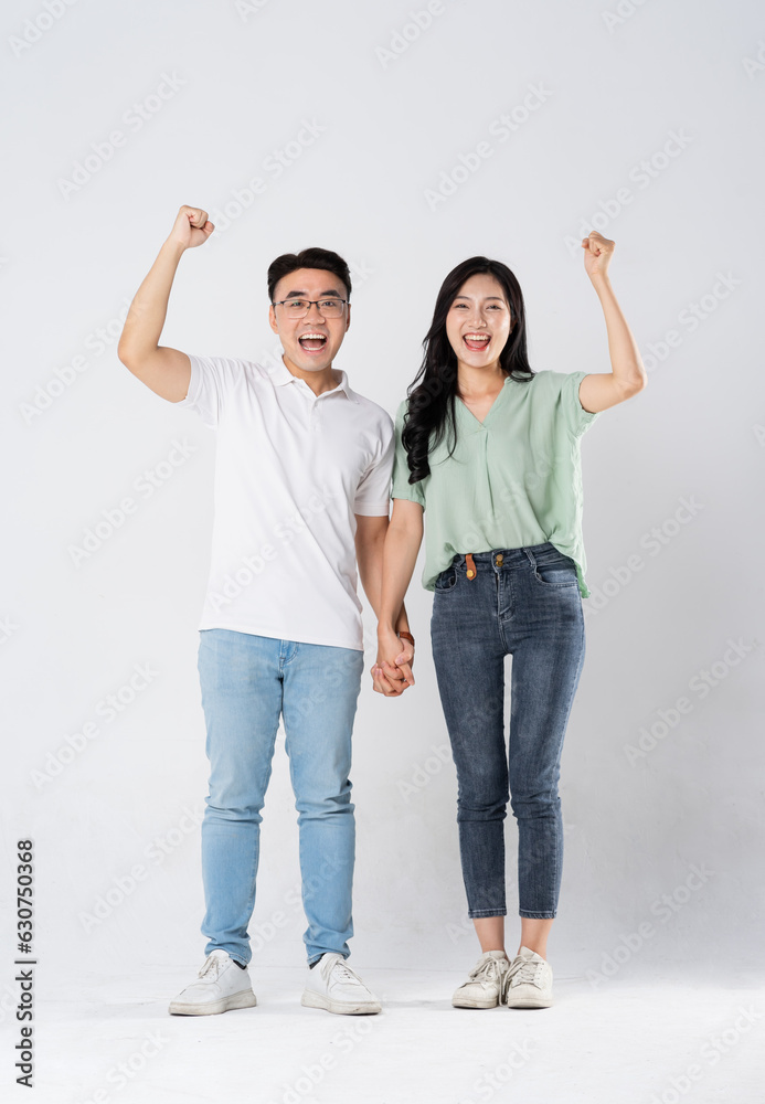 a couple posing on a white background a couple posing on a white background