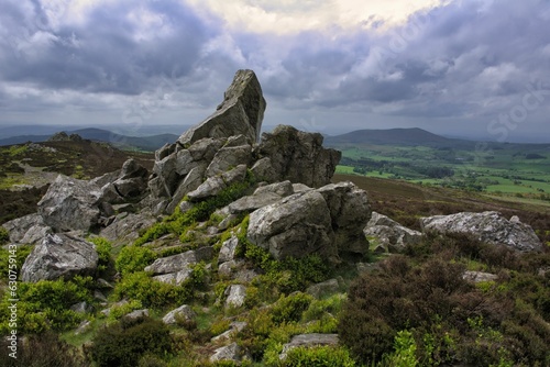 Large stone in Stiperstones Ridge in Shropshire, England, overlooking the surrounding landscape photo