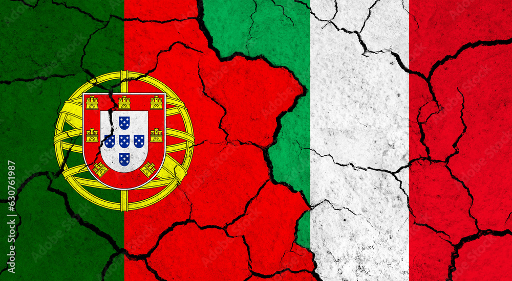 Flags of Portugal and Italy on cracked surface - politics, relationship concept