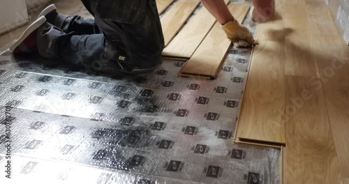 Interior design transformation video: Beautiful floating parquet installation Impressive parquet flooring renovation High-quality worker laying laminate floor. Stunning renovation of old house floors