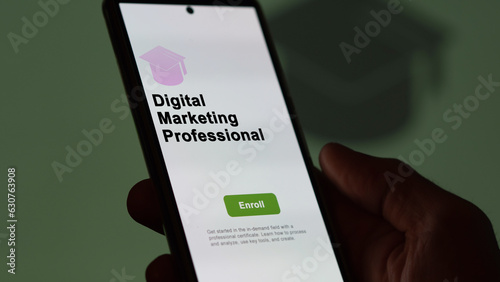 03th August 2023. A student holds a phone, enrolls in courses to study digital marketing professional program, learn new skill and pass certification. Text in English, English text. photo