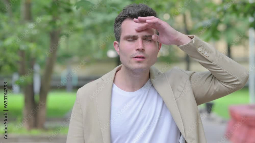 Outdoor Portrait of Casual Young Man Searching for Opportunity Outdoor Portrait of Casual Young Man Searching for Opportunity