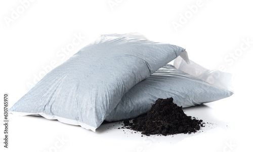Organic soil with bag for planting on white background