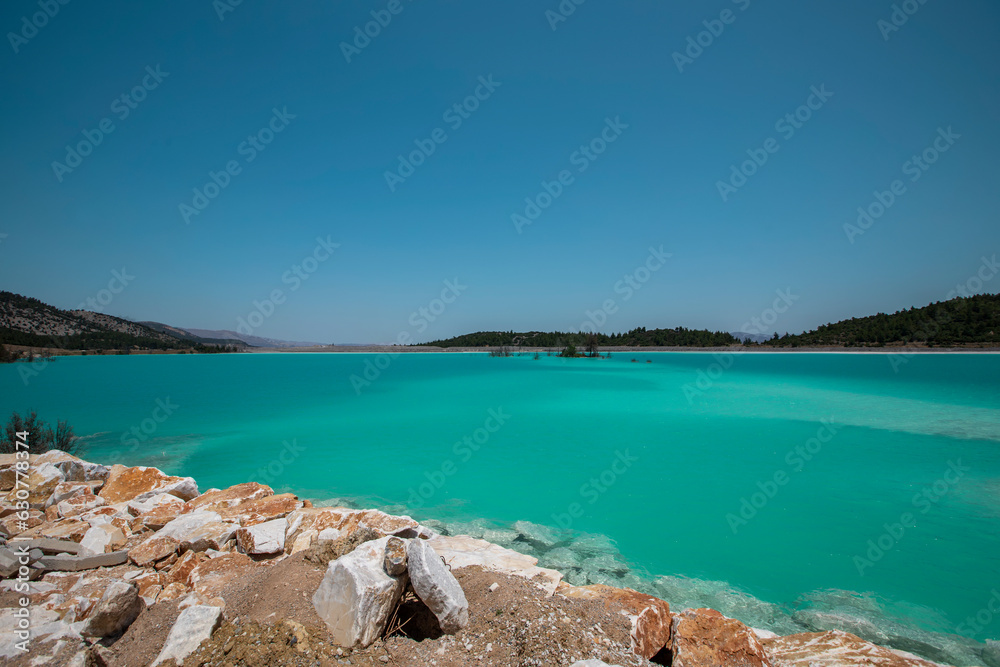 Blue pond (Ash pond) consisting of burned coal ashes in the thermal power plant in the Yatagan district of Mugla province Blue pond (Ash pond) consisting of burned coal ashes in the thermal power plant in the Yatagan district of Mugla province