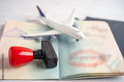 Approved Stamp visa and passport document to immigration at airport in country.