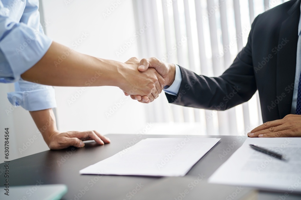 Lawyer Legal counsel Businessman shaking hands successful making a deal. mans handshake. Business partnership meeting concept. Lawyer Legal counsel Businessman shaking hands successful making a deal. mans handshake. Business partnership meeting concept.