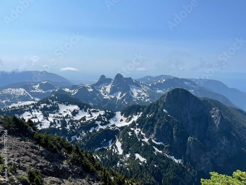 Scenic view of a winter landscape featuring snow-capped mountains