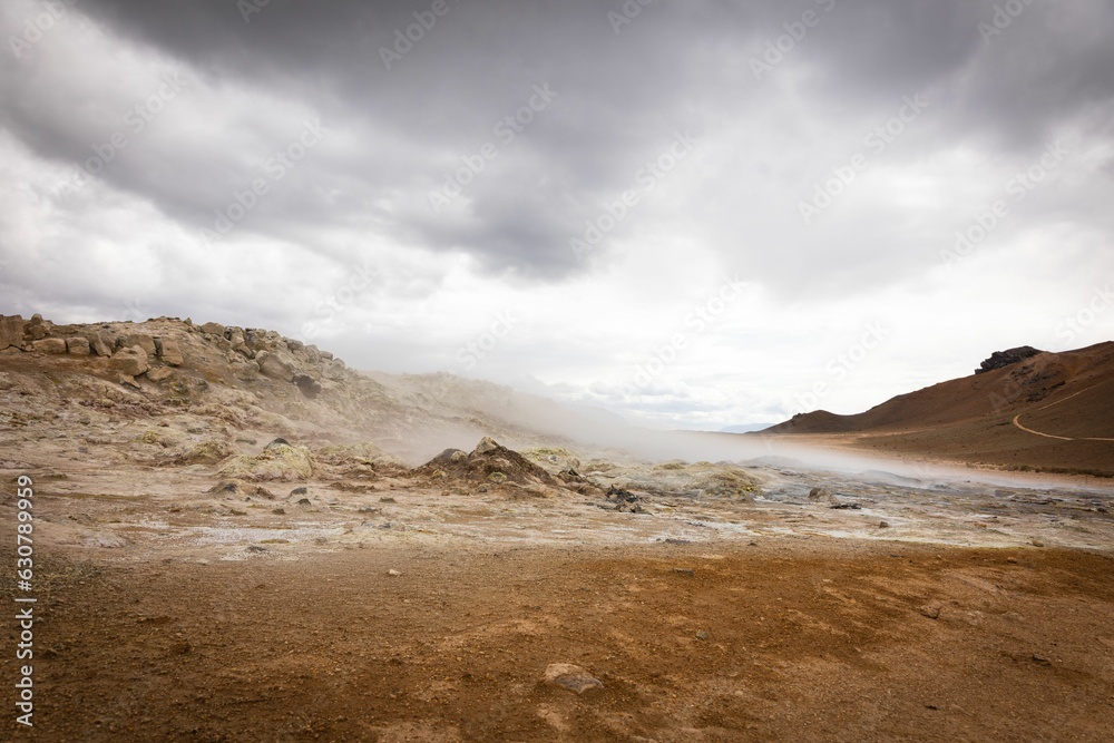 Steaming fumaroles from a geothermal spring at Hverir
