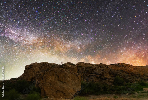 Beautiful night landscape, rock and Milky Way galaxy. Starry night