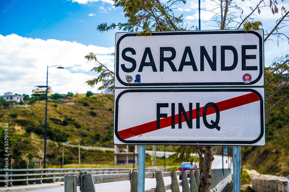 Sarande, Albania - September 5 2022: Sarande and Finiq road sign, highway, travelling, Albania. travel background.