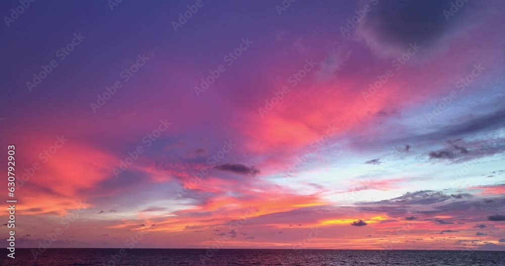 .aerial view sweet pink cloud with purple shadow in blue sky during beautiful sunset..Gradient color. Sky texture, abstract nature background..Scene of colorful pink light trough in the sky
