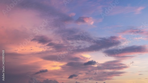 A sunset sky. Abstract nature background. Dramatic blue with orange clouds at twilight.