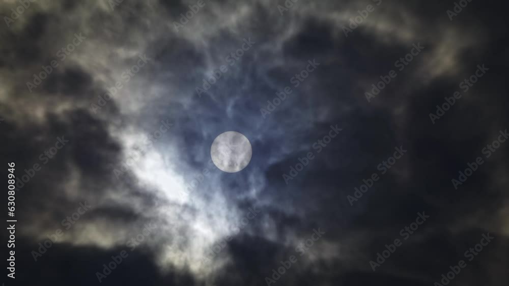 Beautiful view of mystical clouds with a background of the glowing full moon