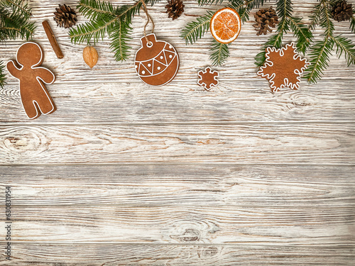 Christmas ginger cookies on wooden background