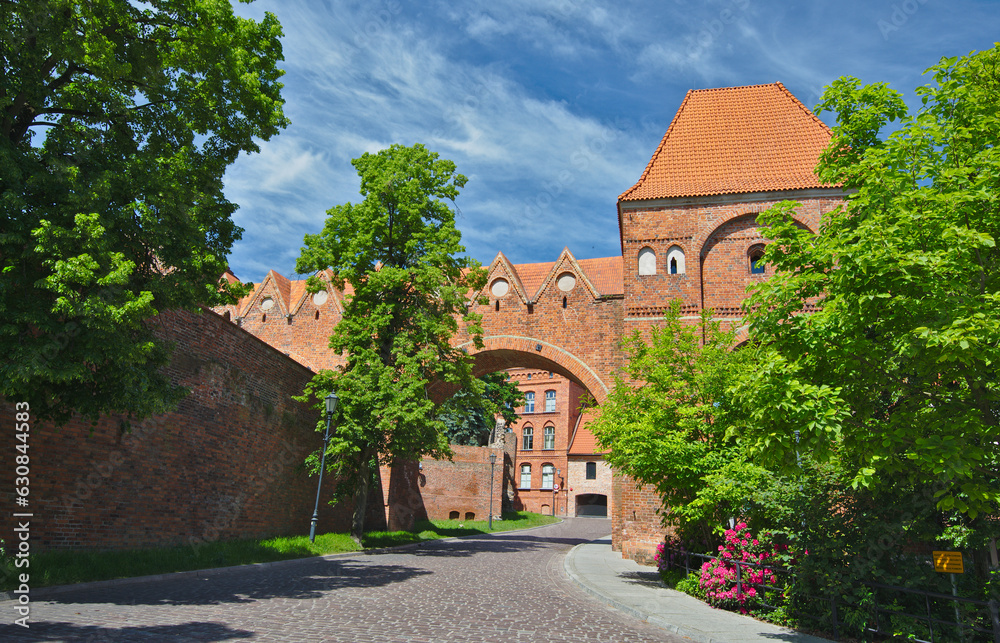 Bricked gate Gdanisko in Torun, Poland in sunny summer day.