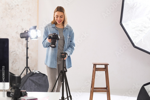 Female photographer with pr...