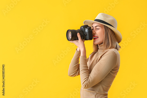 Female photographer with pr...