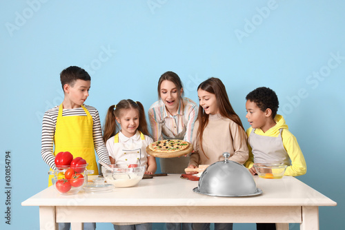Female chef with prepared p...