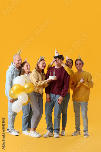 Group of young friends cele...