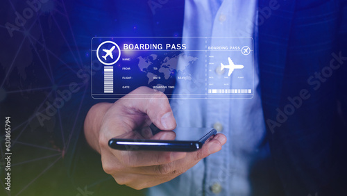 Businessman holding smart phone with boarding pass tickets air travel concept, Choosing checking electronic flight ticket, Booking ticket Online flight travel concept