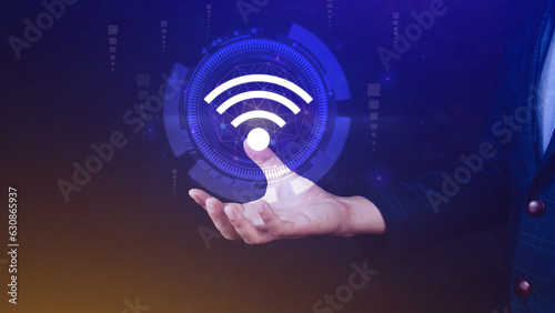 Businessman using holding with wifi icon. Social network business communication concept, Wifi wireless concept free network Internet concept.