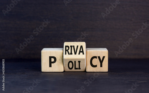 Privacy policy symbol. Concept words Privacy policy on wooden block on a beautiful grey table grey background. Business and privacy policy concept. Copy space.