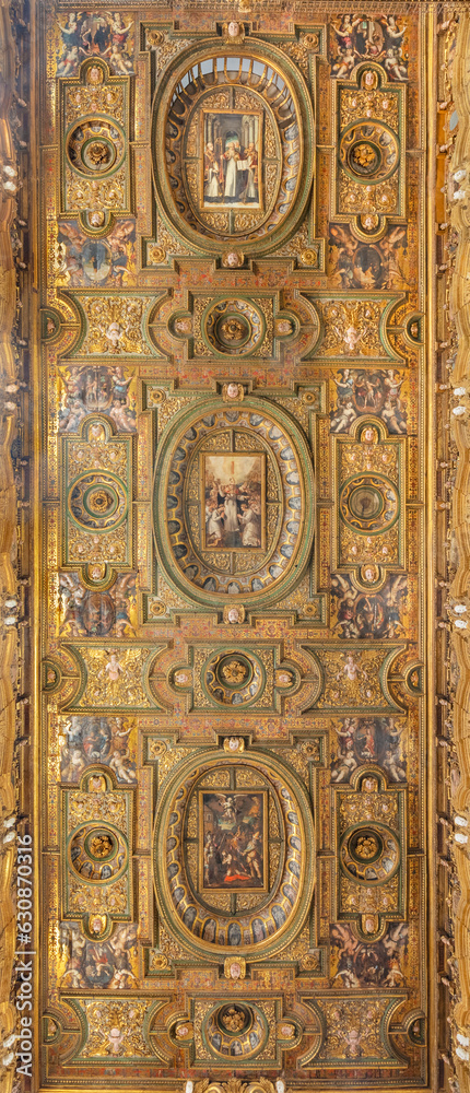 NAPLES, ITALY - APRIL 19, 2023: The carved coffered ceiling in the church Chiesa di San Gregorio Armeno with the paintigns by Teodoro d Errico e Cornelis Smet (1580 - 1584).