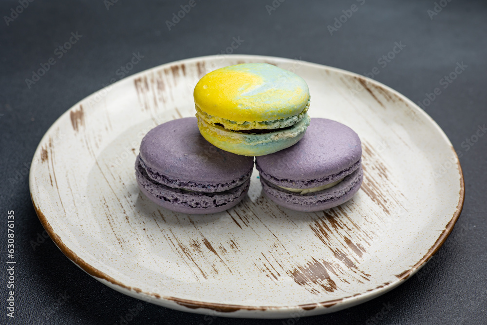 delicious dessert on a plate. Black background. Close up delicious dessert on a plate. Black background. Close up