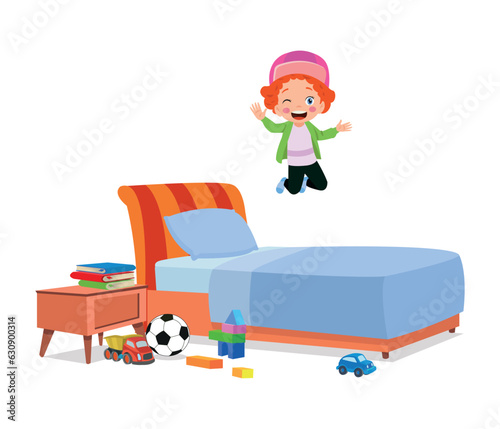 happy cute little kid boy jump on bed