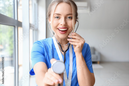 Smiling female doctor or nu...