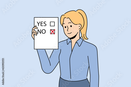 Woman voter demonstrates ballot for presidential elections or referendum with chosen answer no. Voter holds questionnaire designed to survey population on socially important topics.