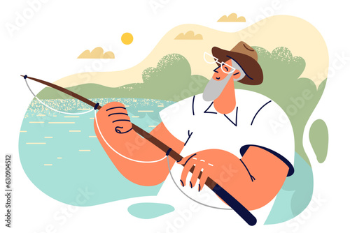 Elderly man holds fishing rod and catches fish sitting in boat or on sea pier in picturesque place