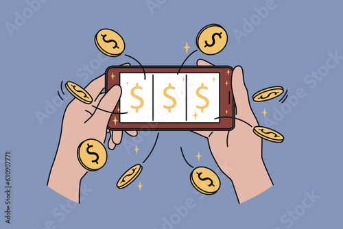 Mobile phone with online casino in hands of man, winning jackpot and big cash prize on website with slot machine. Gambling in smartphone with financial lottery or casino to test luck.