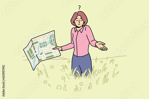 Lost woman with map stands in field and shrugs shoulders, not knowing where to go to find way home. Lost girl in business clothes is among tall grass, not understanding how to get out this situation