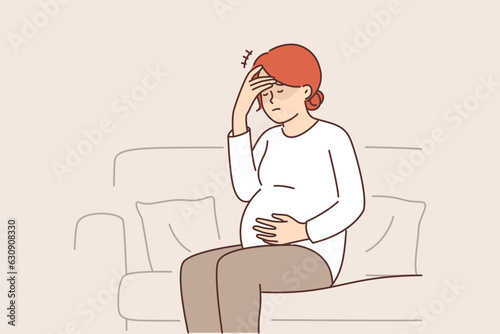 Pregnant woman feeling headache and migraine sitting on couch and waiting for doctor