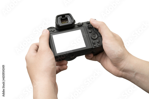 hands holding mirrorless camera on transparent background for checkking picture or take a photo. clipping path