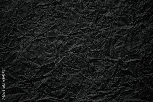 crumpled paper texture, black cardboard sheet, gloomy background