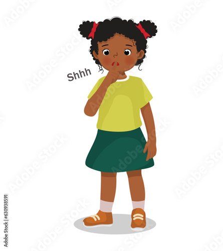 little African girl making silence gesture putting her finger on lip asking to be quiet